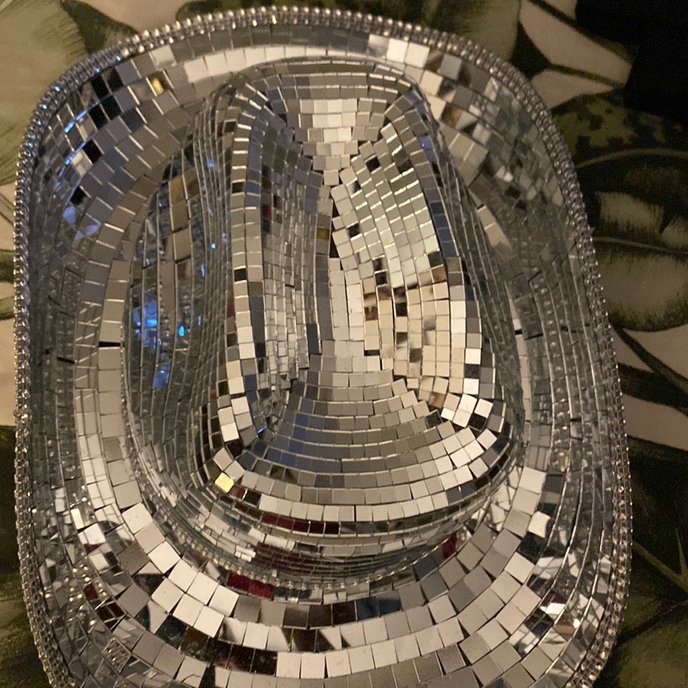 Mirrored cowgirl hat.